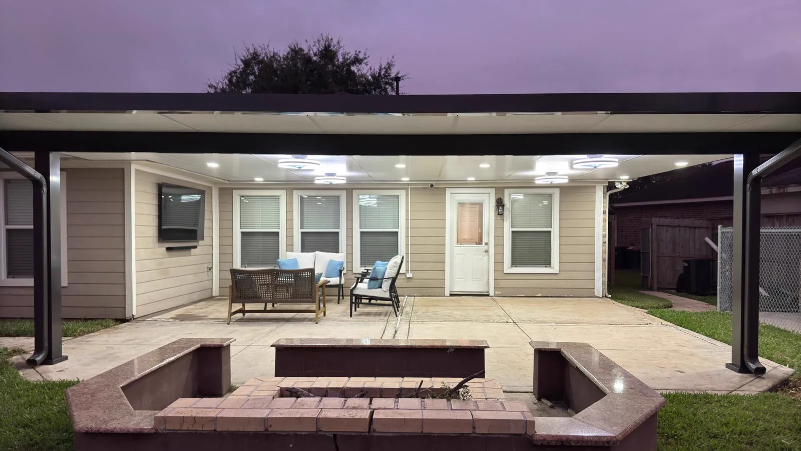 Cozy covered patio set for fall and winter hosting in Texas.
